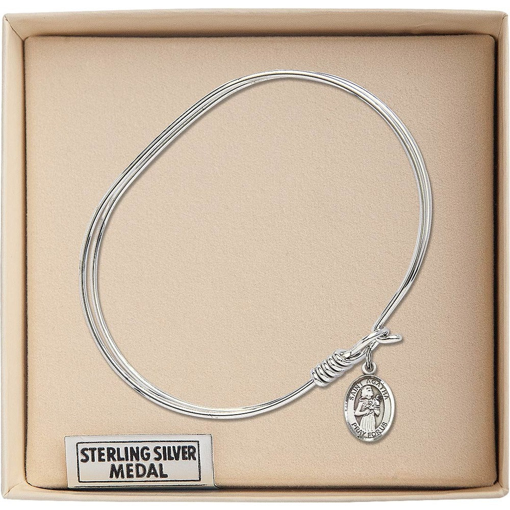 Adult 7" Oval Rhodium Plated Bangle Bracelet with St. Agatha Medal Charm - Image 2